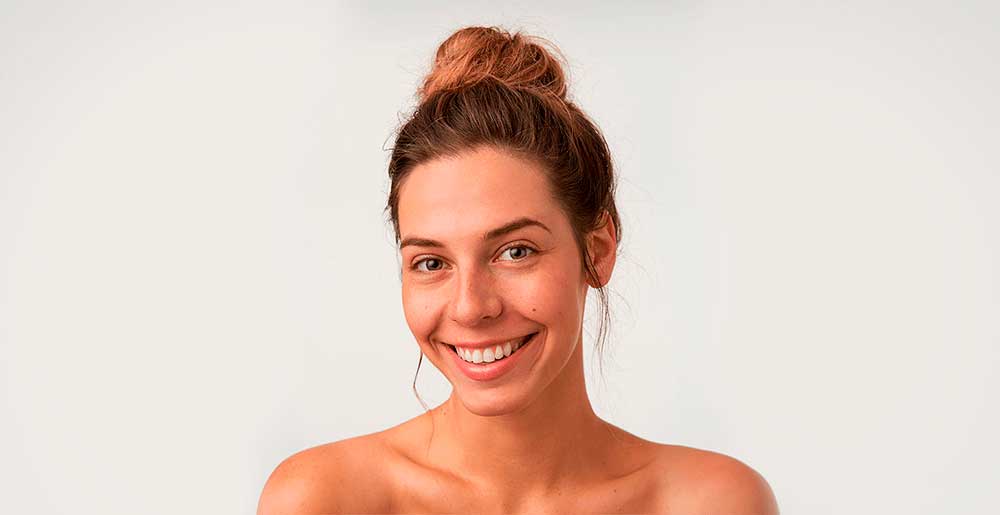 biosante suplementos mulher sorrindo